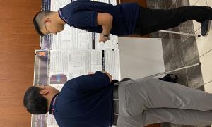 Poster Session:  Group shots of JANUS members viewing posters