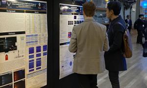 JANUS members at poster session.  Presenting and discussing posters. 